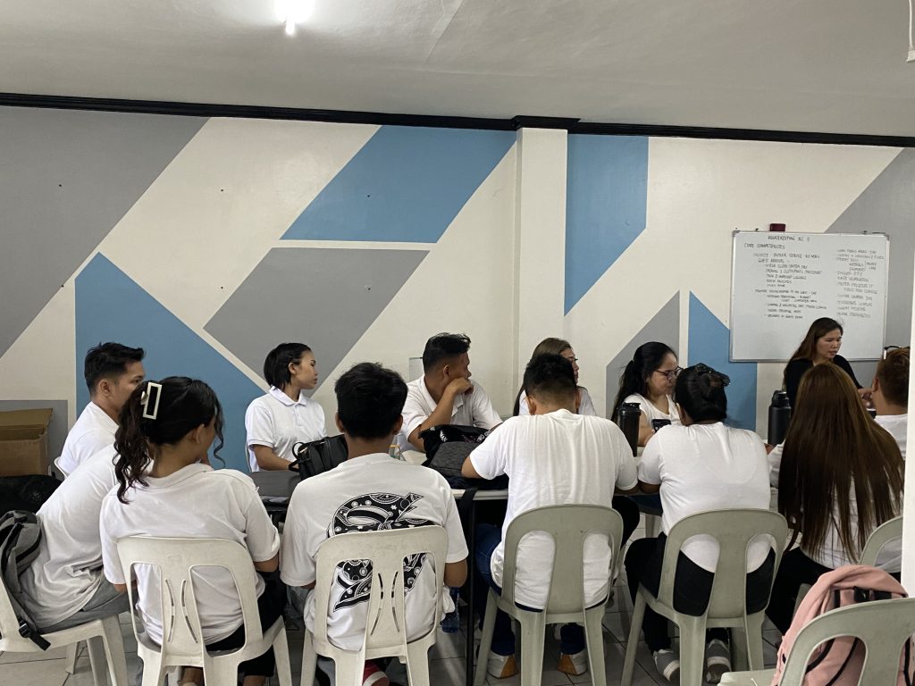 TESDA scholars practicing hotel cleaning procedures