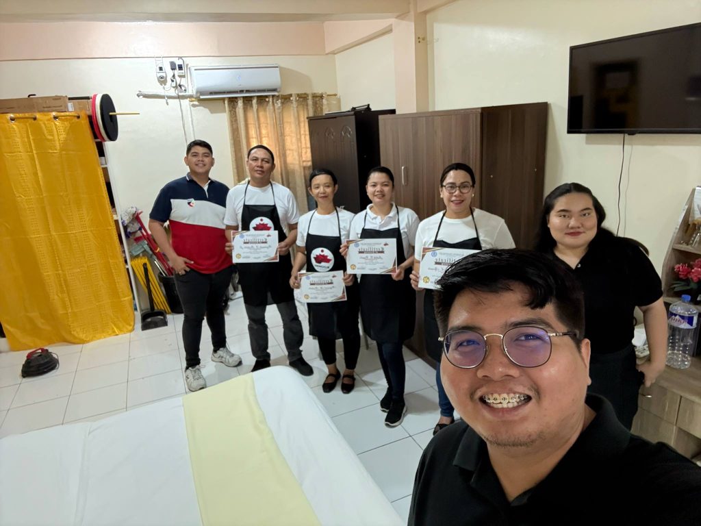 Group photo of TESDA Housekeeping graduates