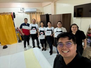 Group photo of TESDA Housekeeping graduates