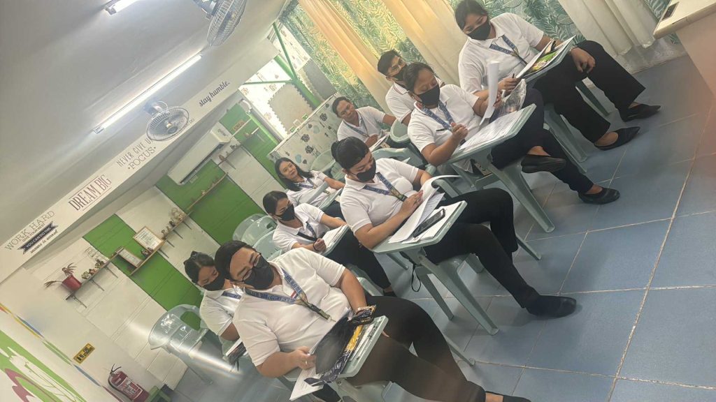 TESDA NCII students practicing housekeeping skills during onsite training